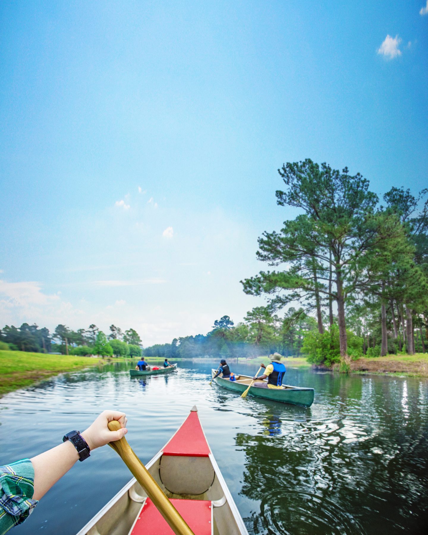 Scouts canoeing on a lake