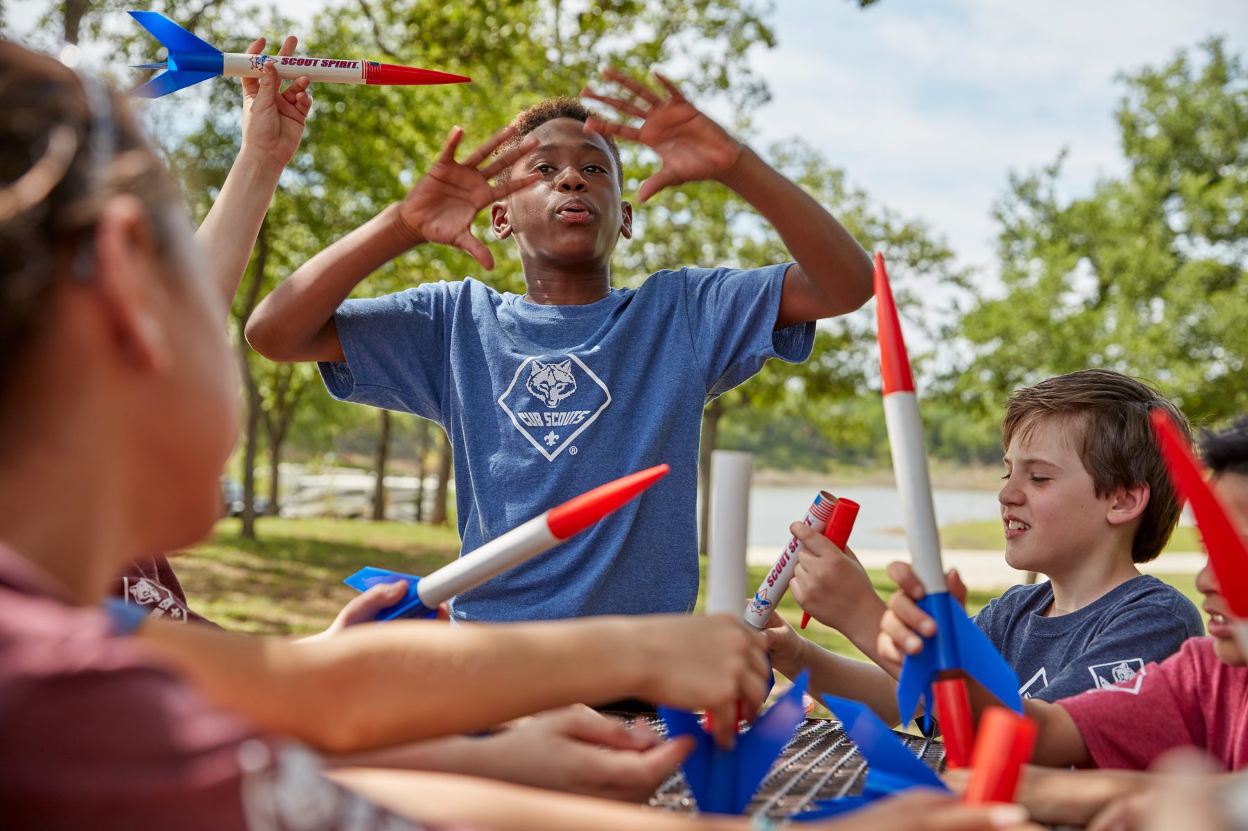 Scouts and leaders working together at a Pack activity